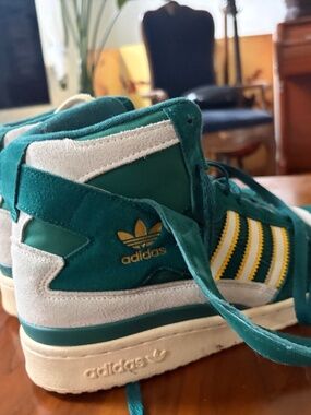 High top Kelly green adidas shoes